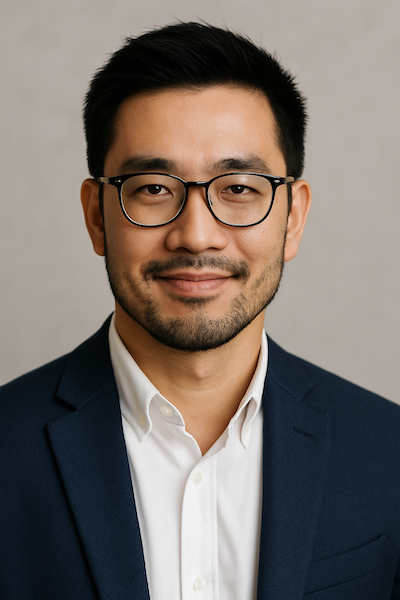 Professional headshot of David, an Asian male entrepreneur wearing a dark suit and light shirt, smiling subtly